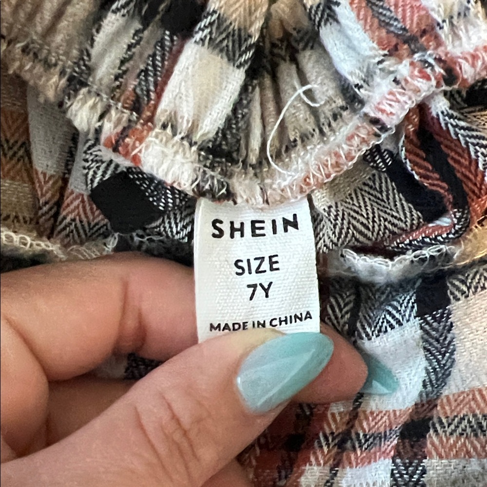 SHEIN Kids Plaid Skirt with Button Accents - Picture 2 of 4
